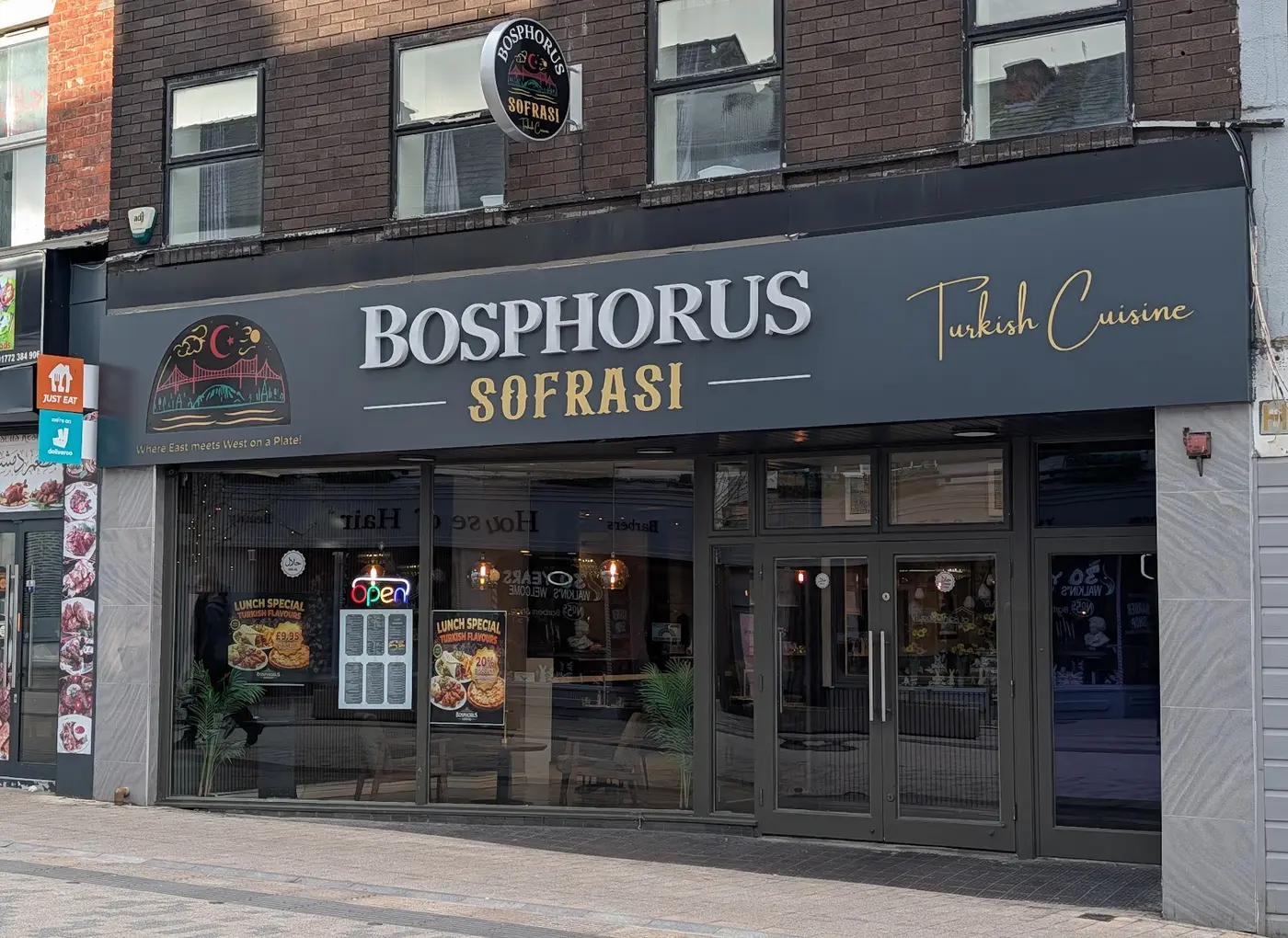The Bosphorus Sofrası shopfront on Friargate, Preston, with its charcoal and gold sign